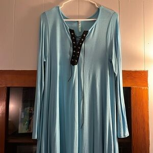 Women dress. Blue in color with black.